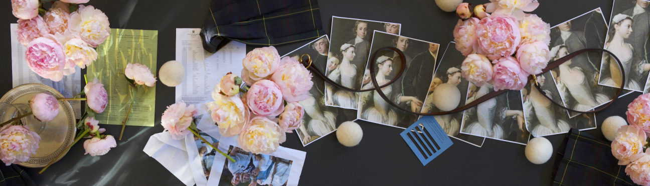 flat-lay-with-flowers-and-photographs