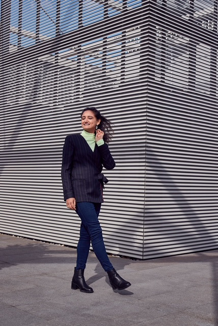 woman in front of building