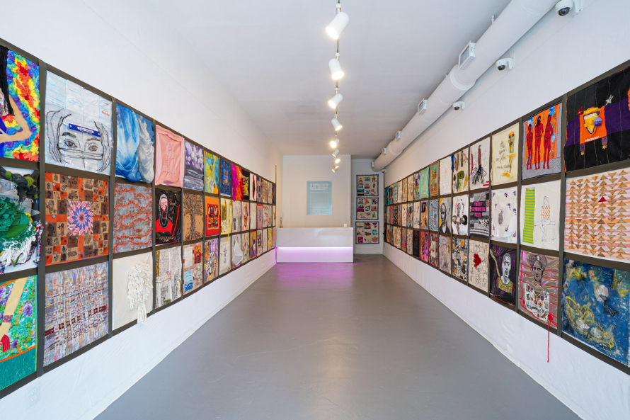 Installation view of 64 Women Pulling at the Threads of Social Discourse at the CAMP Gallery.