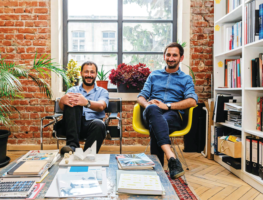 men sitting in office