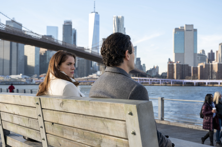 mand and woman on bench in brooklyn